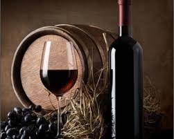 fine wine, glass, wine bottle and barrel