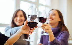 Ladies celebrating with wine